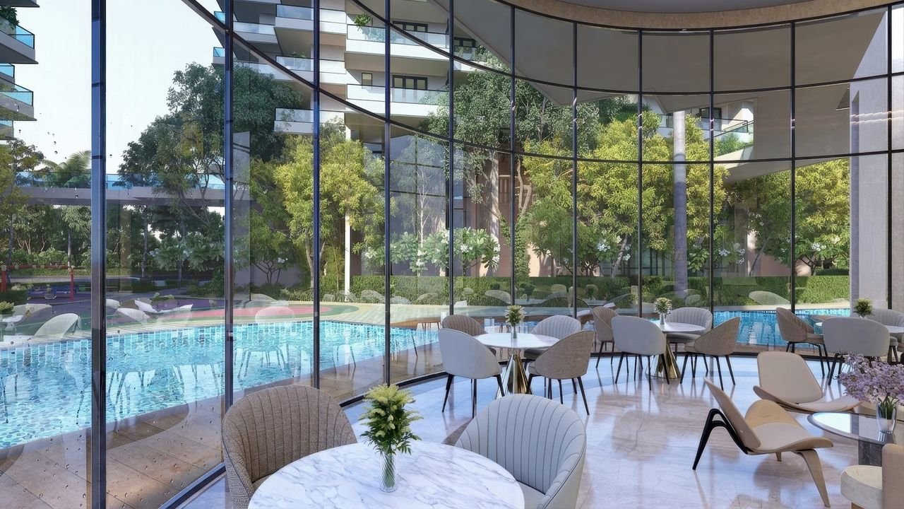 Multi-level glass clubhouse over the swimming pools